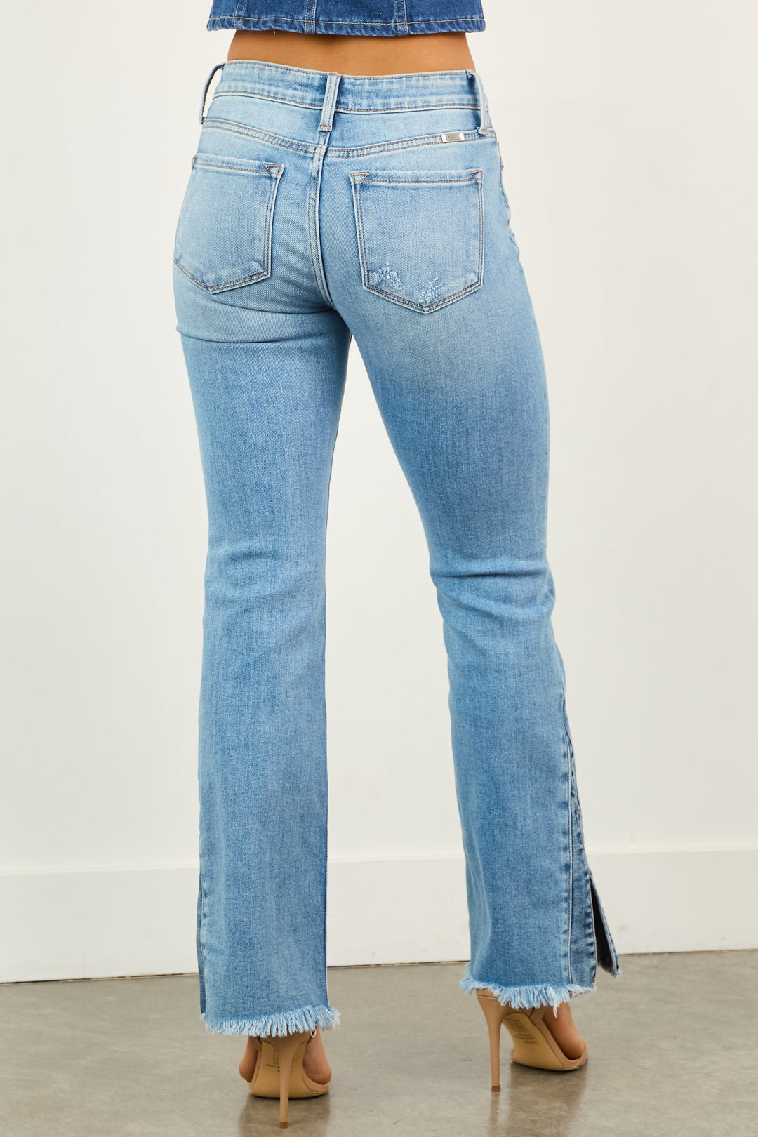 ATALIA | WOMEN’S BLUE FLARED JEANS WITH SPLIT HEM