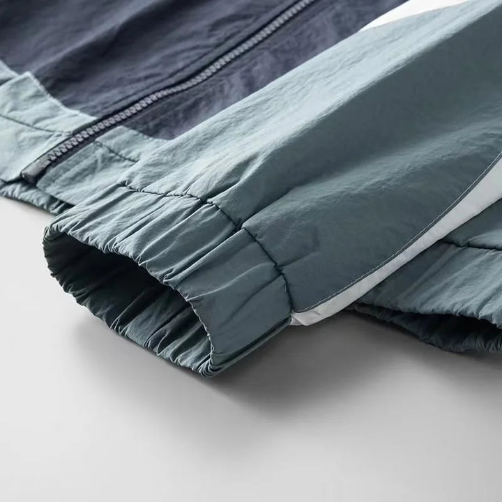 ARIEL | COLOUR-BLOCK RAIN JACKET